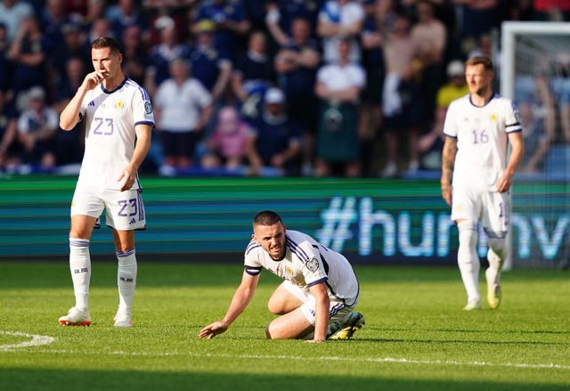 John McGinn, centre