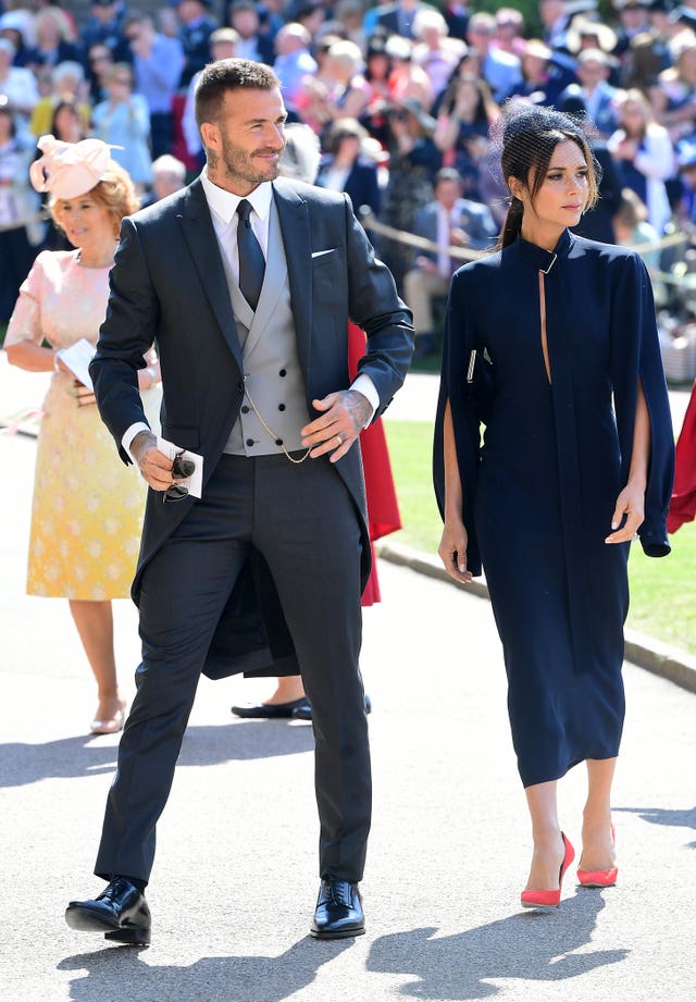 David and Victoria Beckham arrive to take their place at the ceremony (Ian West/PA)