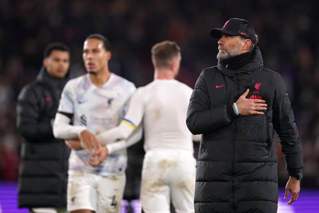 Liverpool manager Jurgen Klopp salutes the fans
