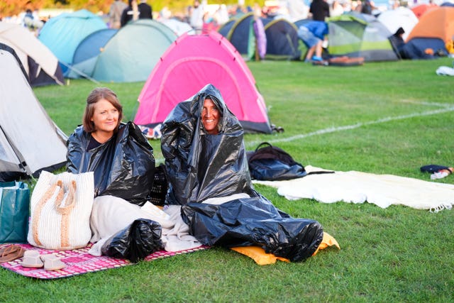 Spectators in the queue on day one of the 2026 Wimbledon Championships at the All England Lawn Tennis and Croquet Club, London