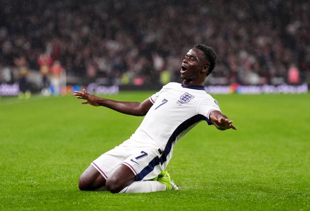 England’s Bukayo Saka celebrates scoring against Serbia