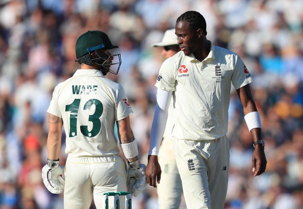 Archer (right) and Australia’s Matthew Wade engaged in a fierce battle as the batsman made a century to give Australia hope of an unlikely run chase