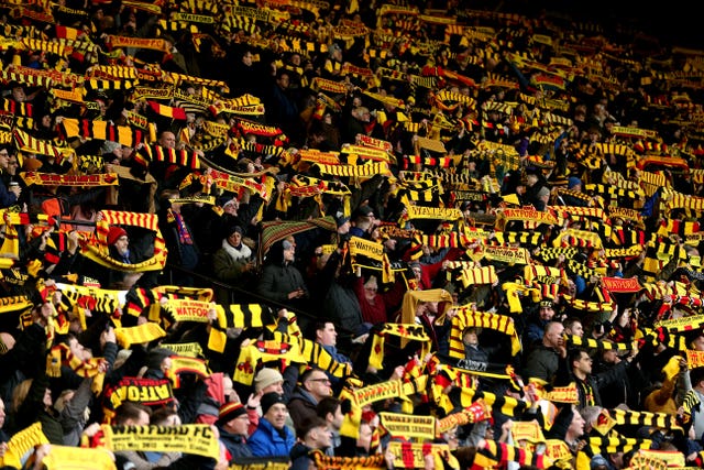 Watford fans show support for their team in the stands