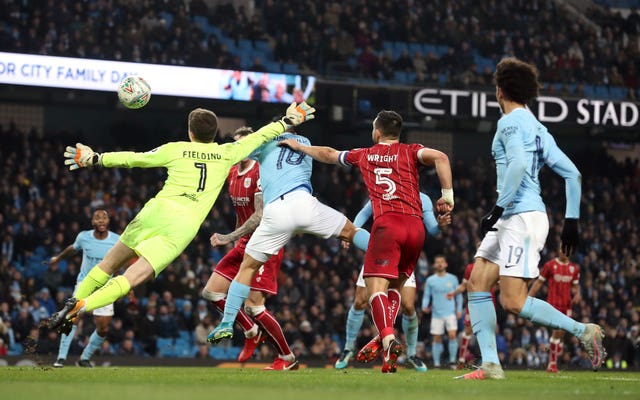 Sergio Aguero headed a late winner against Bristol City
