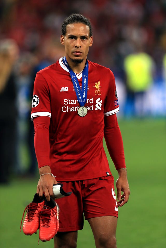 Virgil van Dijk cut a dejected figure after collecting his loser's medal