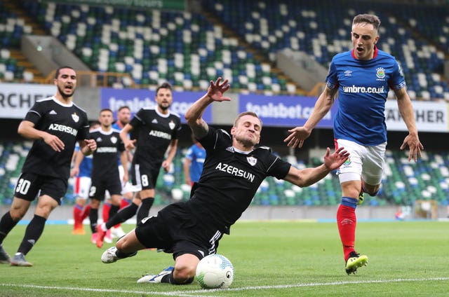 Former Linfield midfielder Joel Cooper, left, has replaced Mark Sykes in Baraclough's squad