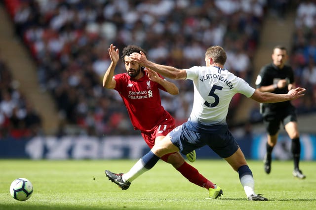 Mohamed Salah, left, takes on Jan Vertonghen