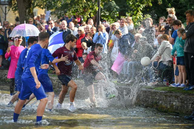 Annual Football in the River match