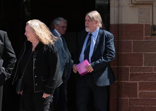 Mike Edgar (right) leaving St Mark’s Church