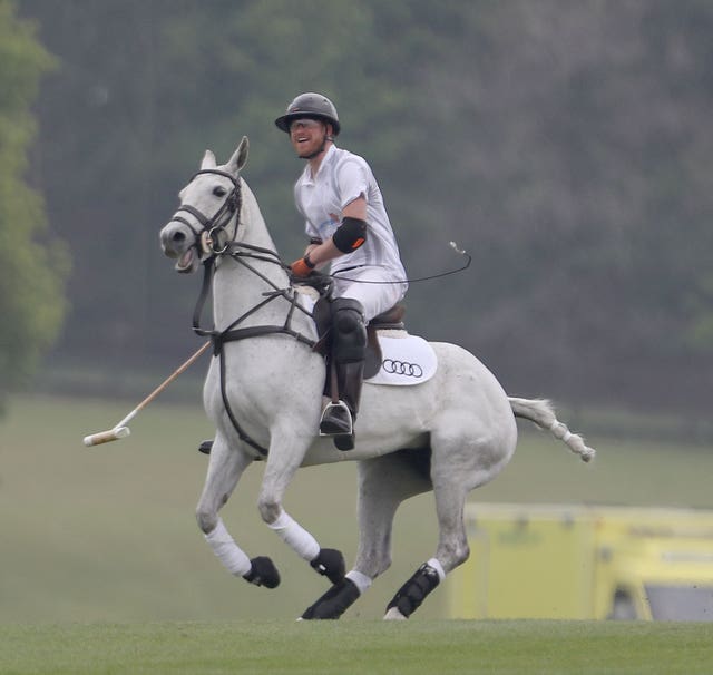 Prince Harry takes part in the annual Audi Polo Challenge at Coworth Park polo club in Ascot, Berkshire (Steve Parsons/PA)