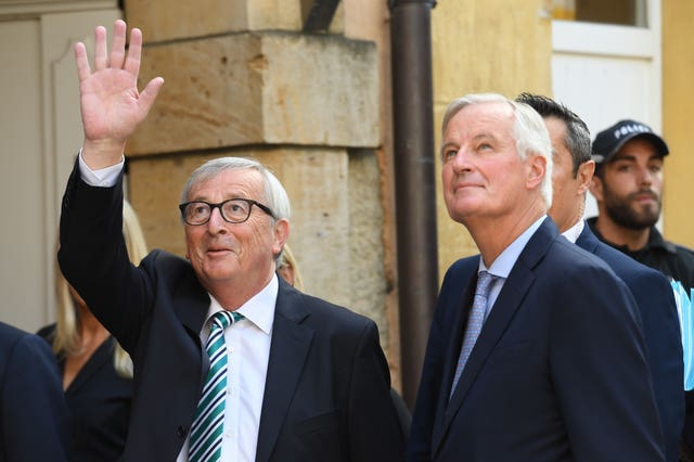 Jean-Claude Juncker and Michel Barnier in Brussels