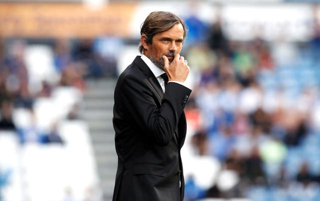 Phillip Cocu was keeping his Wayne Rooney thoughts to himself 