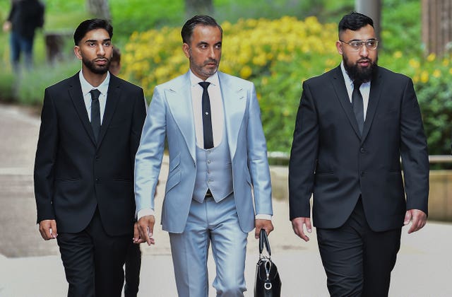 Three men in suits