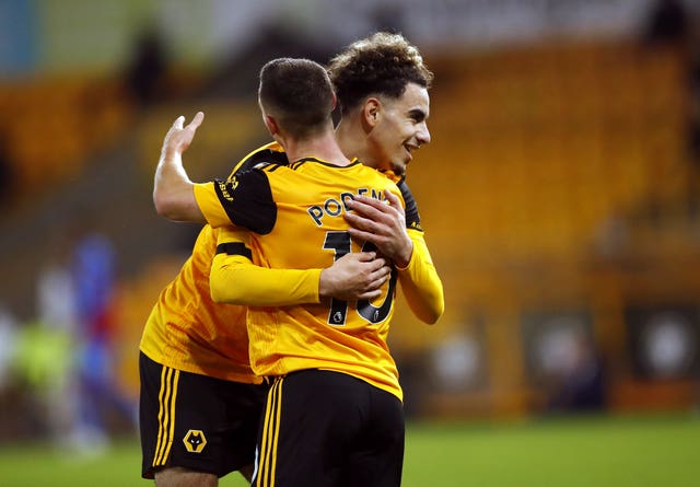 Daniel Podence celebrates his goal with fellow scorer Rayan Ait-Nouri, right