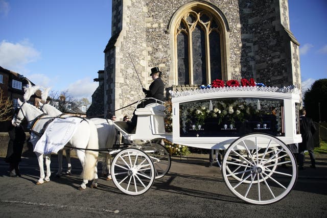 A horse-drawn carriage carrying the coffin of Liam Payne arrives for the funeral service of One Direction singer at St Mary’s Church in Amersham, Buckinghamshire