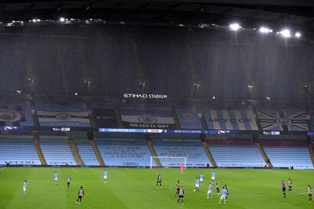 Manchester City play in front of an empty Etihad Stadium 