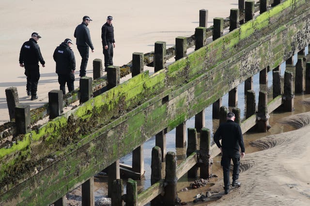 Police officers on Aberdeen beach