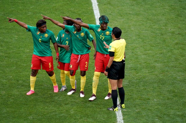 Cameroon were furious with referee Qin Liang on more than one occasion 