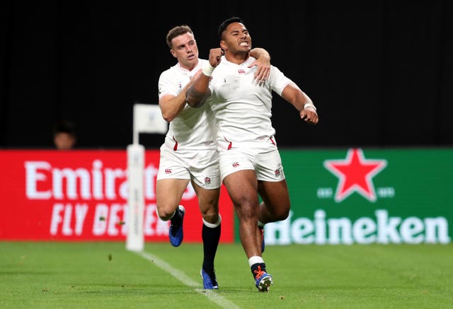 Manu Tuilagi (right) scored a first-half brace to put England 18-3 ahead at half-time in their opener against Tonga