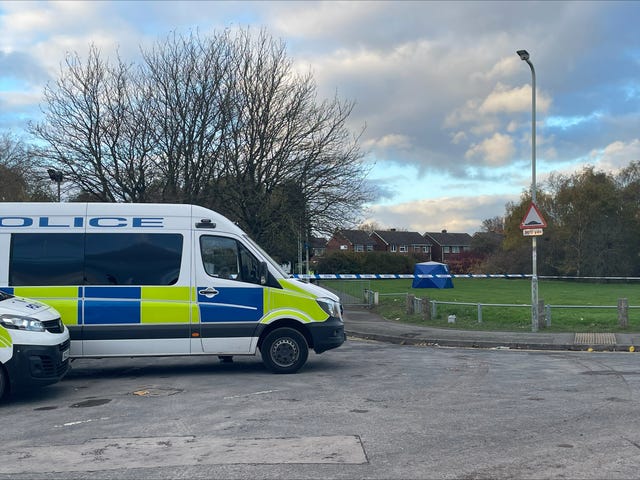 A forensic blue tent by the police cordon in East Park, off Laburnum Road, Wolverhampton, where Shawn Seesahai, 19, died after being stabbed