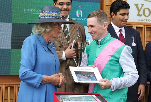 Camilla speaks to jockey Colin Keane, winner of the Juddmonte International Stakes