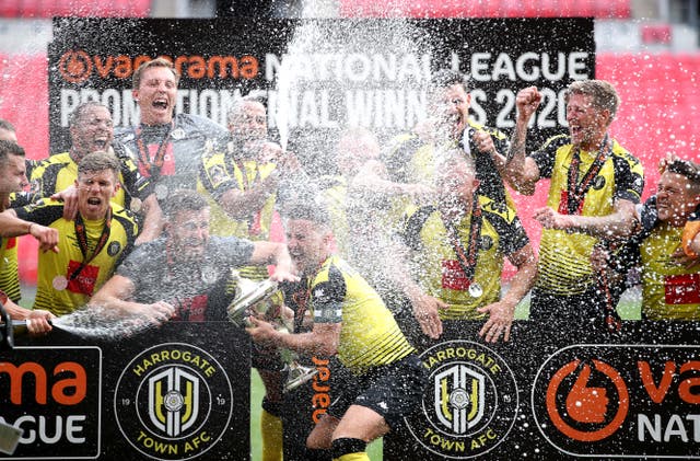 Harrogate celebrate promotion after their victory against Notts County at Wembley 