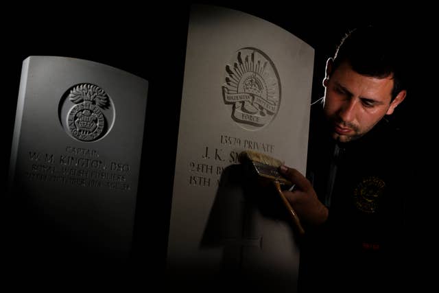 CWGC staff working on a headstone