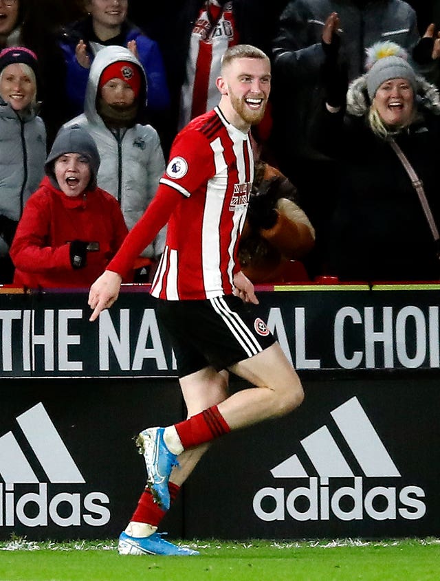 Oliver McBurnie celebrates scoring his side's goal