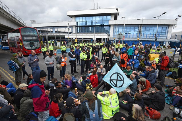 An Extinction Rebellion protest at London City Airport