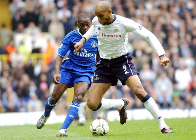 Frederic Kanoute was leading the line for Tottenham when Devine was born 