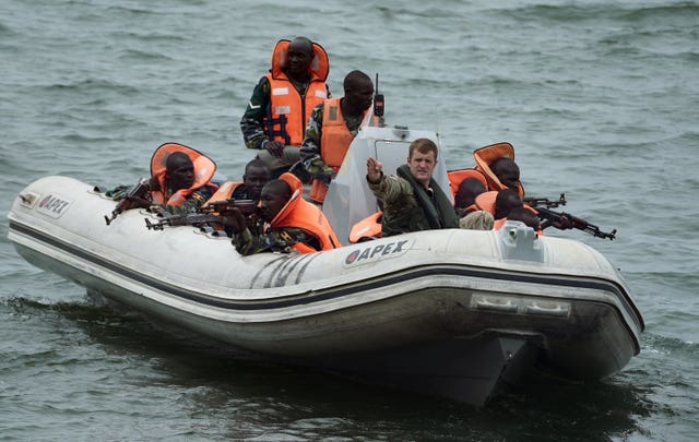 Royal Marines work alongside soldiers from the Ugandan Army