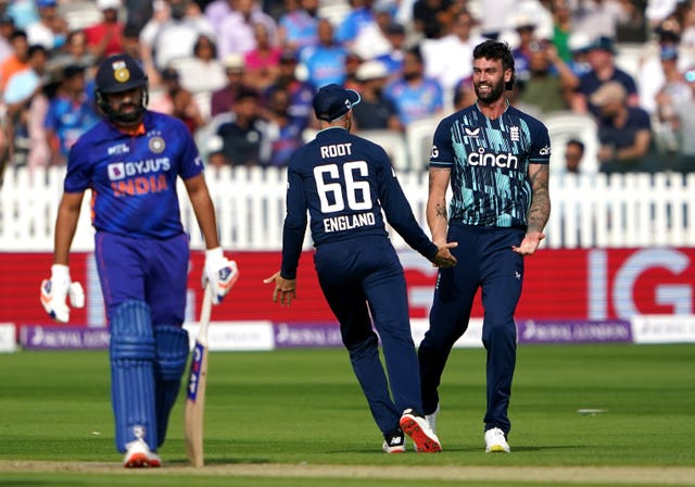 Reece Topley celebrates the wicket of India’s Rohit Sharma