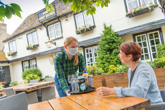Two women in a pub garden