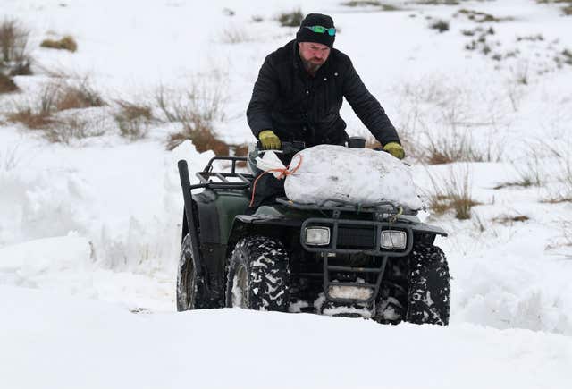 Jimmy Feeney delivers coal to a remote cottage near Stirling (Andrew Milligan/PA)