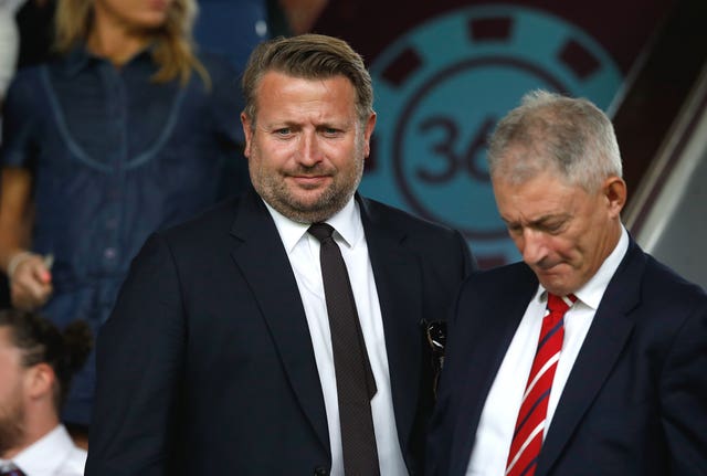 Manchester United chief executive Richard Arnold, left, told fans the club were taking 