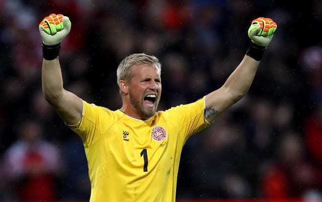 Denmark’s Kasper Schmeichel celebrates his side’s second goal in the win over Wales (Tim Goode/PA).