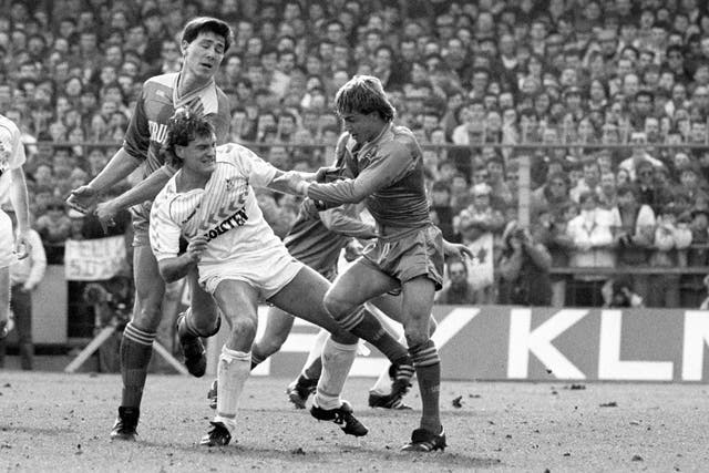 Glenn Hoddle was one of the many midfielders to go head-to-head against Wimbledon's Dennis Wise (right)