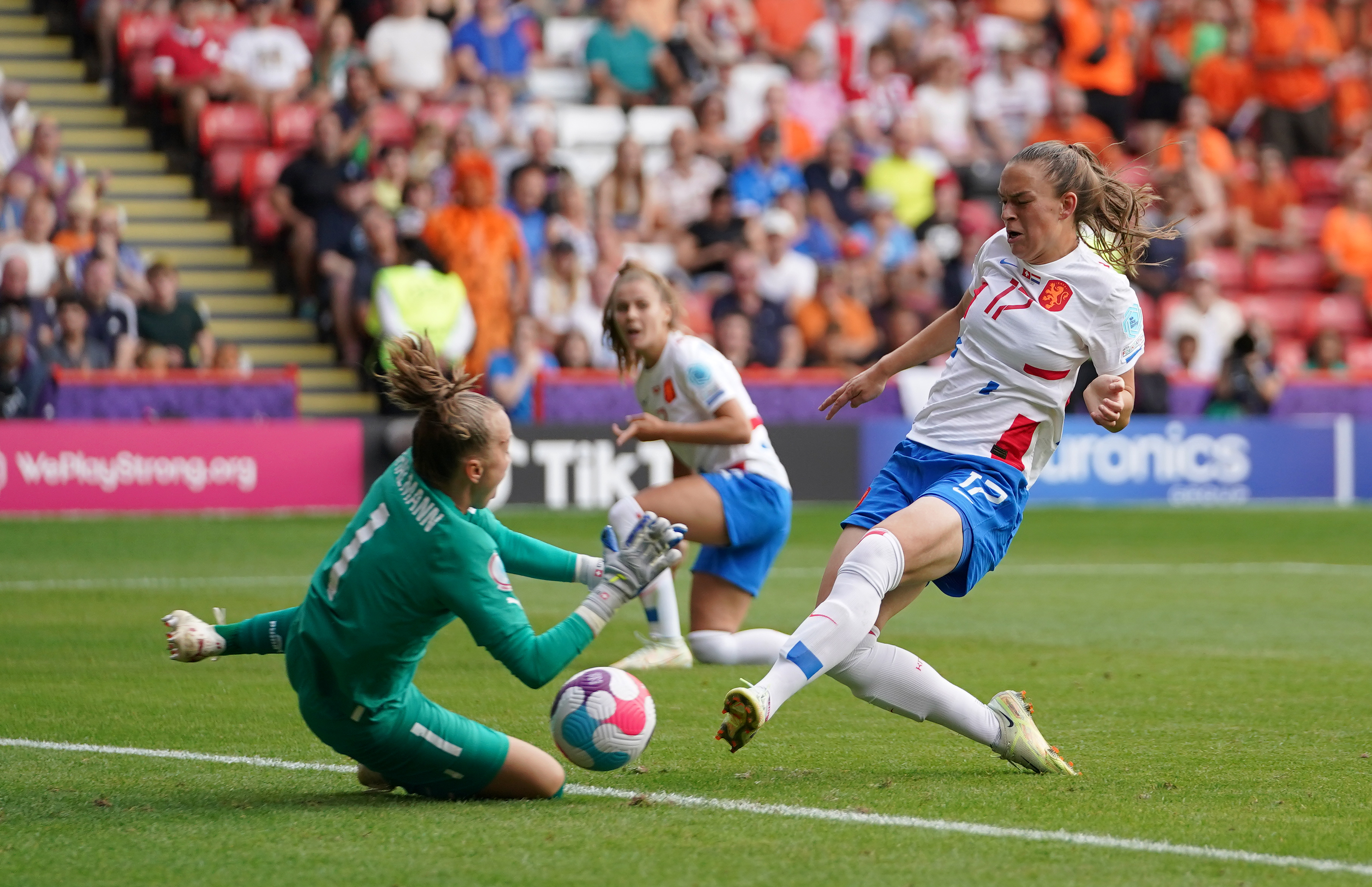 Romee Leuchter, right, scores the Netherlands’ fourth goal against Switzerland