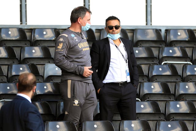 Andrea Radrizzani, right, took a flight to Europe after watching Leeds win at Derby