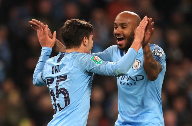 Brahim Diaz, left, celebrates one of his goals on Thursday with Fabian Delph