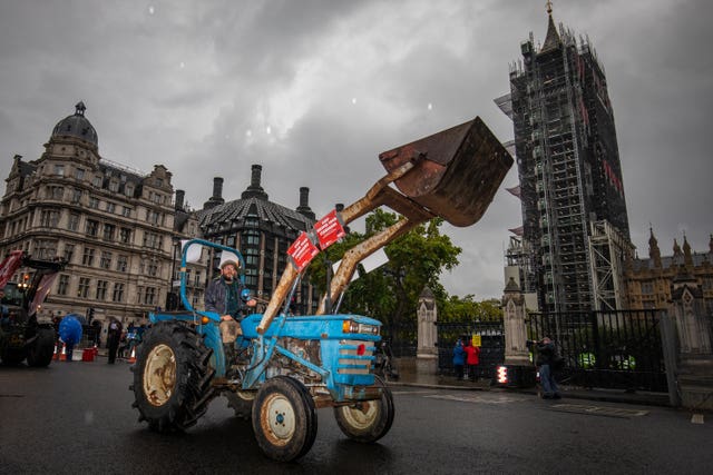 Farmers in tractors take part in a protest over food and farming standards, organised by Save British Farming, at Westminster, London