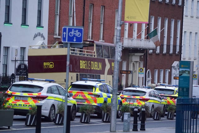 Garda vehicles parked on a street