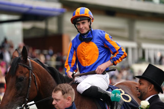 Ryan Moore celebrates winning the St James’s Palace Stakes on Paddington