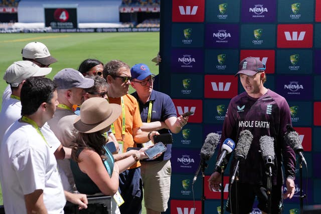 Ollie Pope fields questions at a press conference in Brisbane.
