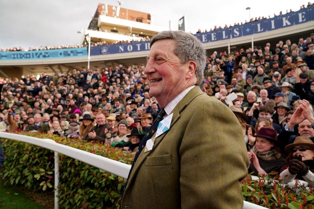 Trainer Jeremy Scott celebrates Golden Ace's Champion Hurdle success