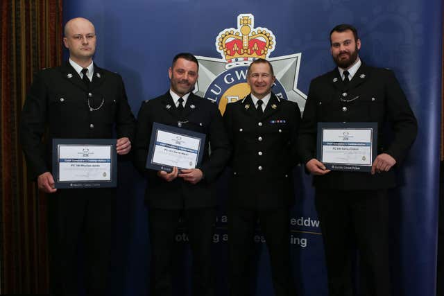 Chief Constable Julian Williams with Pc Rhydian Jones, Pc Gareth Marsh and Pc Ashley Cotton (Gwent Police/PA)