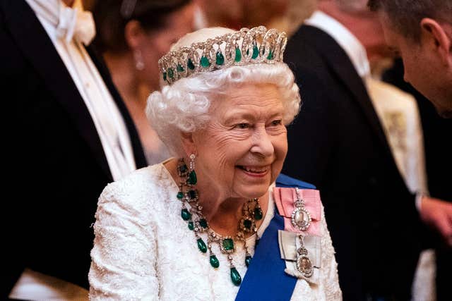 Queen Elizabeth II wearing the Greville emerald and diamond necklace at diplomatic reception in Buckingham Palace in 2019