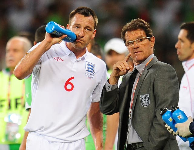 The decision to relieve Terry of the captaincy armband for a second time hastened the departure of Fabio Capello, right, as England manager (Owen Humphreys/PA)