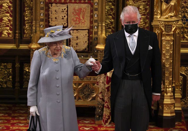 The Queen with Charles after she delivered the speech