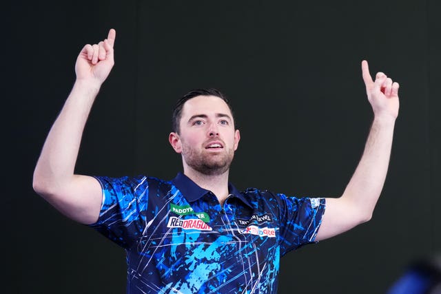 Luke Humphries celebrates